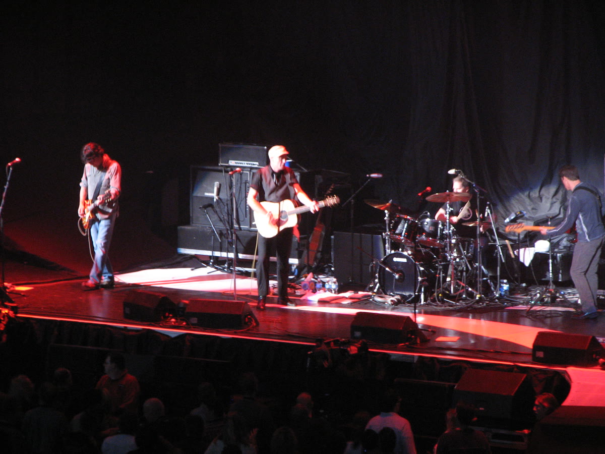 Gord Downie centre stage with guitar