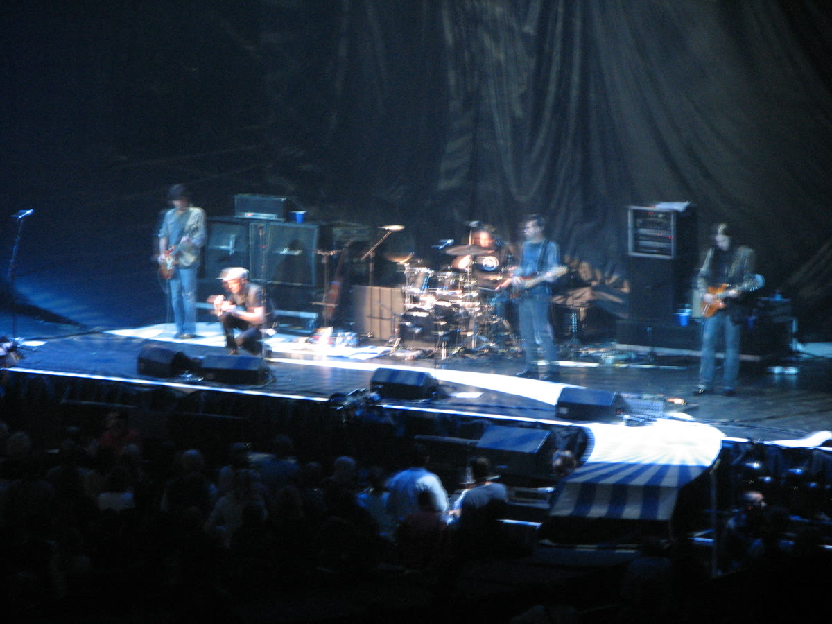 The Tragically Hip under blue stage lighting